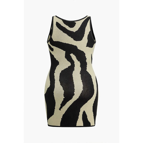 Black and beige zebra-striped dress on a white background
