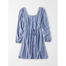 Blue dress with long sleeves on a white background