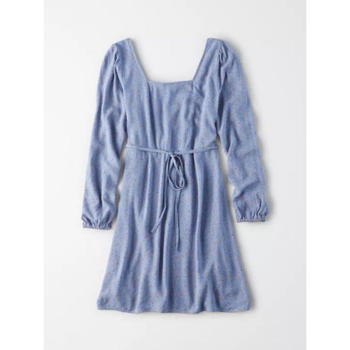Blue dress with long sleeves on a white background