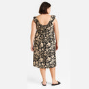 Woman wearing a floral dress on a white background