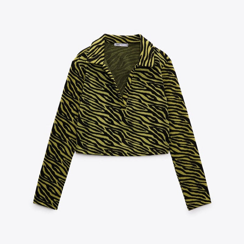 Zebra patterned jacket on a white background
