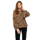 Woman wearing a leopard print blouse on a white background