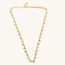 Gold necklace on a white background